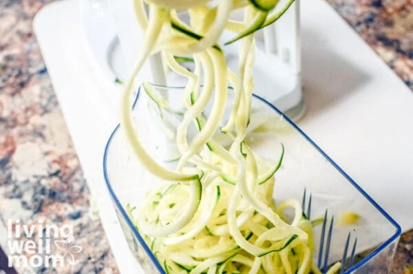 Pile of zoodles coming out of a spiralizer