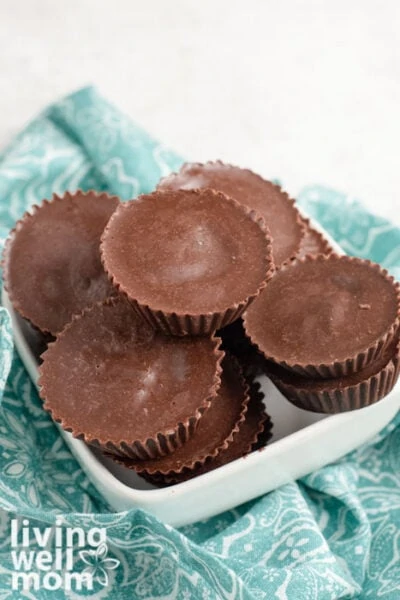 Almond butter cups in a white bowl