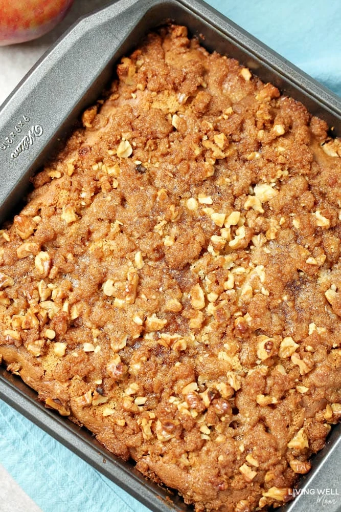 Freshly baked apple coffee cake recipe in square pan.