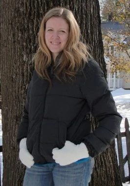 Erika Bragdon posing in a winter coat