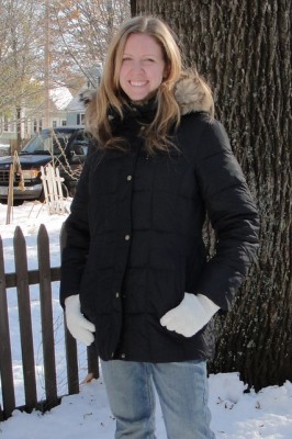 woman wearing black winter coat with fuzzy hood