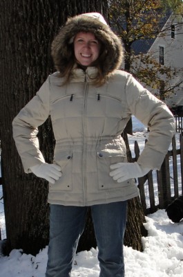 woman wearing white winter coat with fuzzy hood