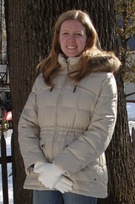 woman wearing white winter coat with fuzzy hood