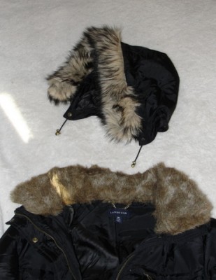 top part of black winter coat with removable fuzzy hood