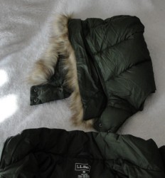 top part of green winter coat with removable fuzzy hood