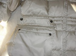 outside pockets of white winter coat