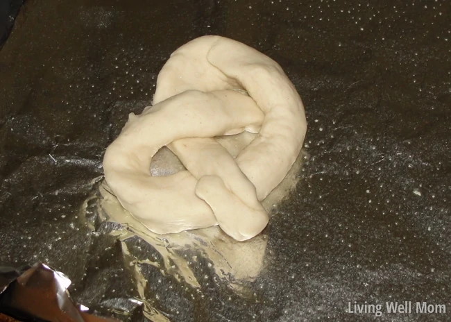 unbaked pretzel dough on foil 