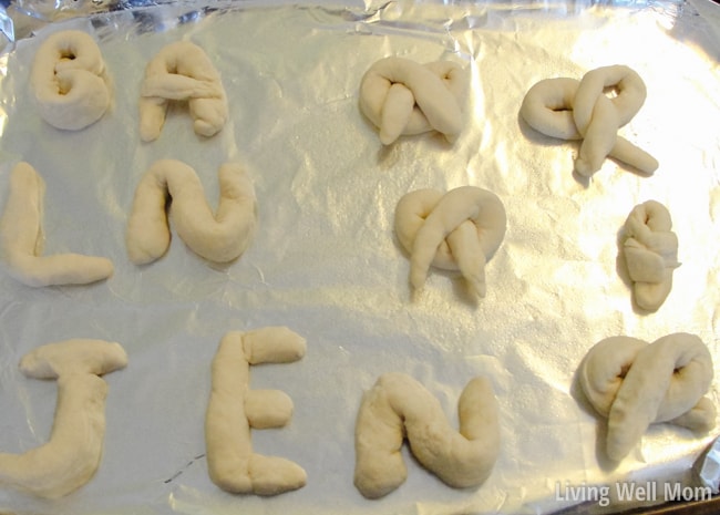unbaked soft pretzel dough in shapes and letters 