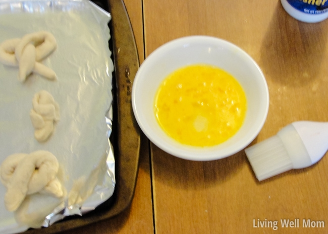 egg in a bowl ready to be put onto pretzels 