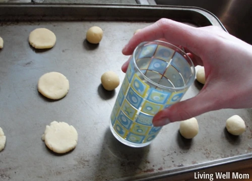 flattening the balls with a cup