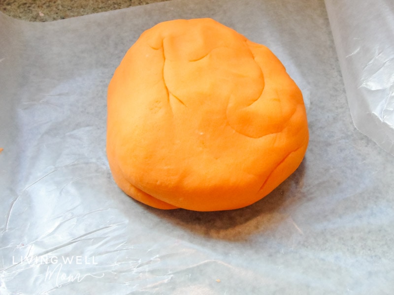 A ball of brightly colored playdough.