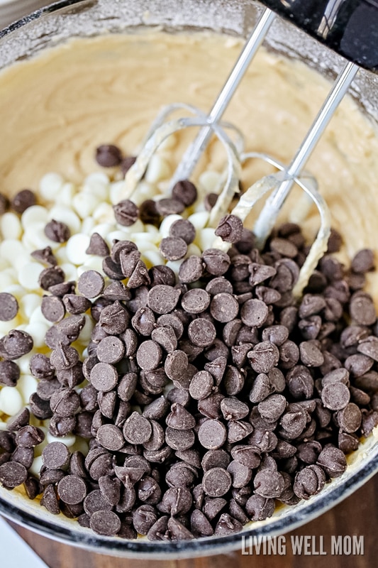 adding chocolate chips to the bowl