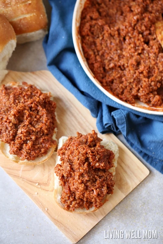 Two hamburger buns with ground beef mixture added on top.