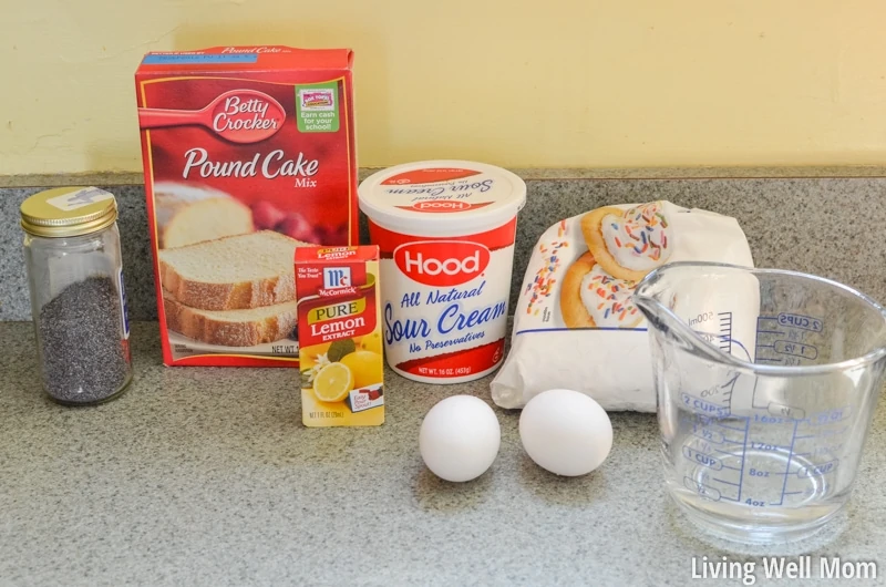 Lemon Poppy Seed Cake ingredients ( pound cake mix, poppy seeds, lemon extract, sour cream, 2 eggs, sugar/flour 