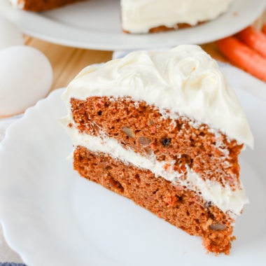 A piece of  carrot cake on a plate