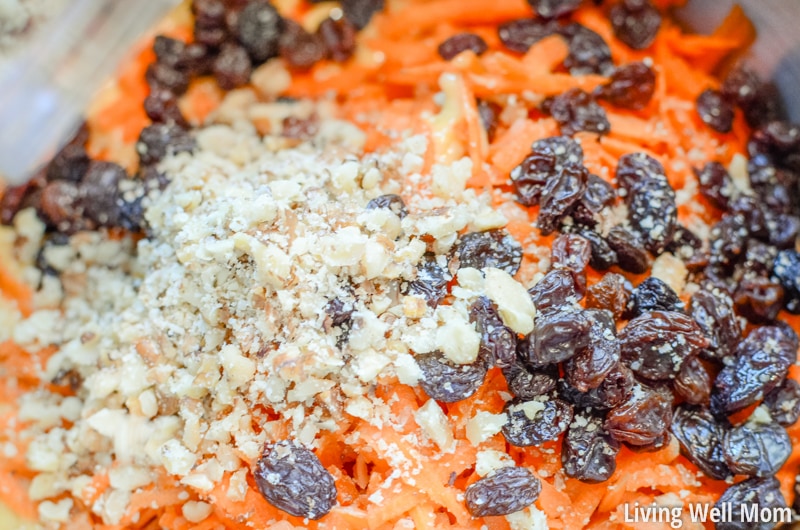 ground walnuts, shredded carrots, and raisins in a bowl