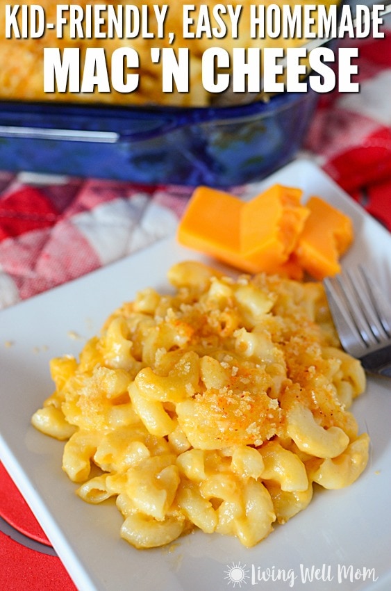 easy homemade macaroni and cheese for kids on a white plate with checkered red napkin