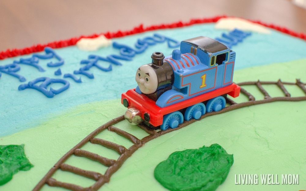 toy Thomas the Tank engine train on a homemade birthday cake