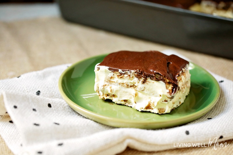 chocolate eclair cake slice on a green plate