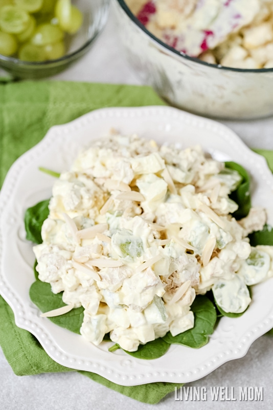 This delicious Almond Chicken Salad has slivered almonds, grapes, celery, and hard-boiled eggs tossed with cooked chicken and combined with mayo, sour cream, and seasoning. It's perfect for a delicious lunch or even enjoyed as supper on a hot summer day.