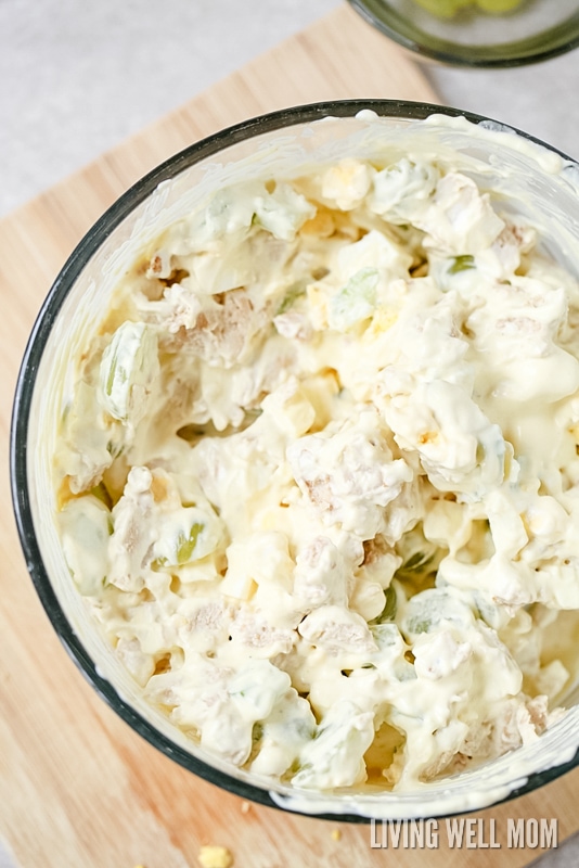 This delicious Almond Chicken Salad has slivered almonds, grapes, celery, and hard-boiled eggs tossed with cooked chicken and combined with mayo, sour cream, and seasoning. It's perfect for a delicious lunch or even enjoyed as supper on a hot summer day.