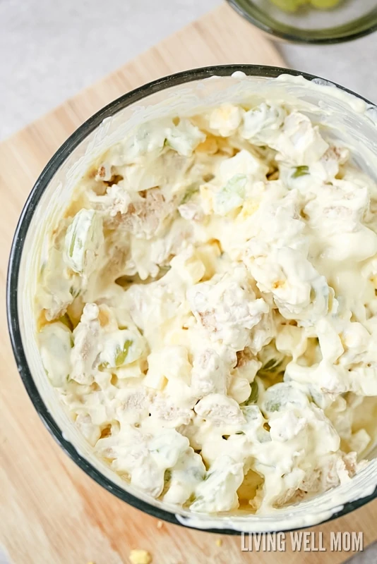 This delicious Almond Chicken Salad has slivered almonds, grapes, celery, and hard-boiled eggs tossed with cooked chicken and combined with mayo, sour cream, and seasoning. It's perfect for a delicious lunch or even enjoyed as supper on a hot summer day.