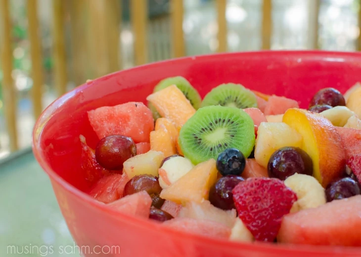 A close up of a bowl of fruit salad