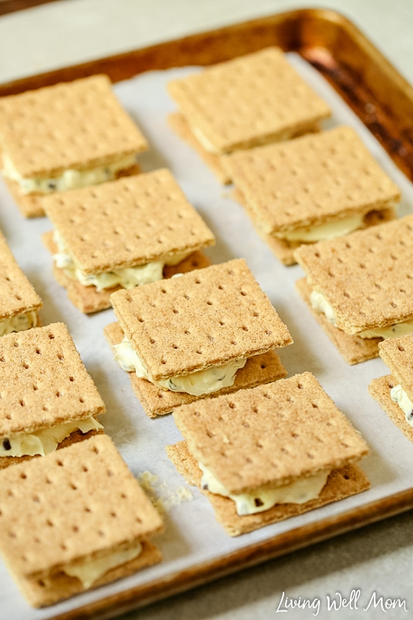 graham cracker ice cream sandwiches on a cookie sheet