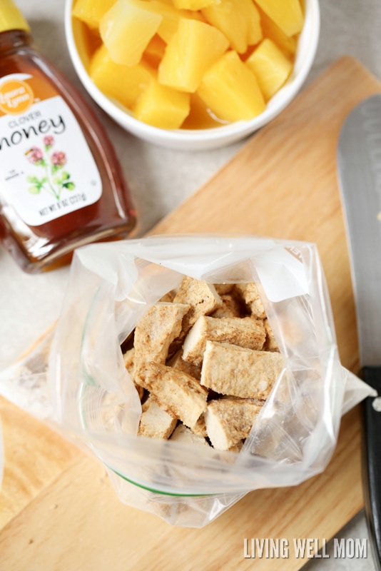 chicken strips in ziplock bag with pineapple and honey