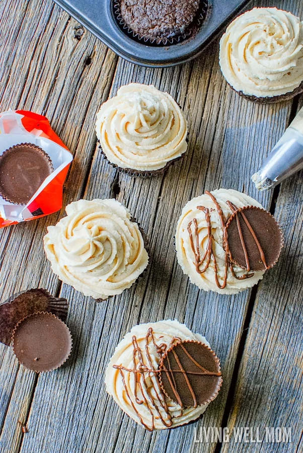 Chocolate Hazelnut Cupcakes with Peanut Butter Cup Frosting - this simple recipe is dessert heaven for chocolate and peanut butter lovers with a peanut butter cream cheese frosting and peanut butter cups drizzled with chocolate!