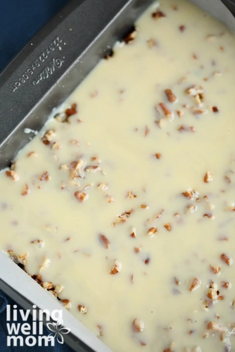 sweetened condensed milk poured over seven layer bars