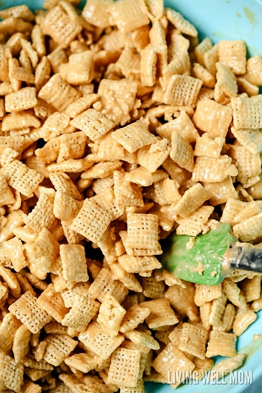 puppy chow recipe being made in a bowl