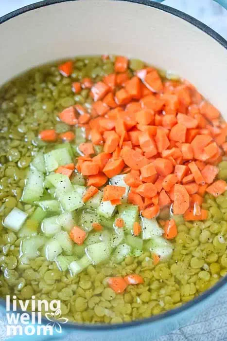 celery and carrots added to soaked peas