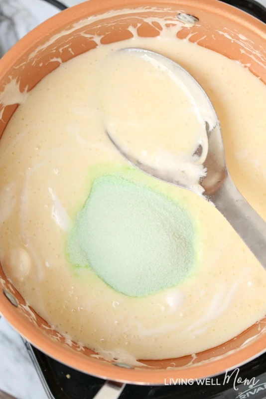 Adding lime jello to melted butter and marshmallows 