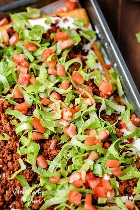 mexican pizza toppings- lettuce, tomato, ground beef