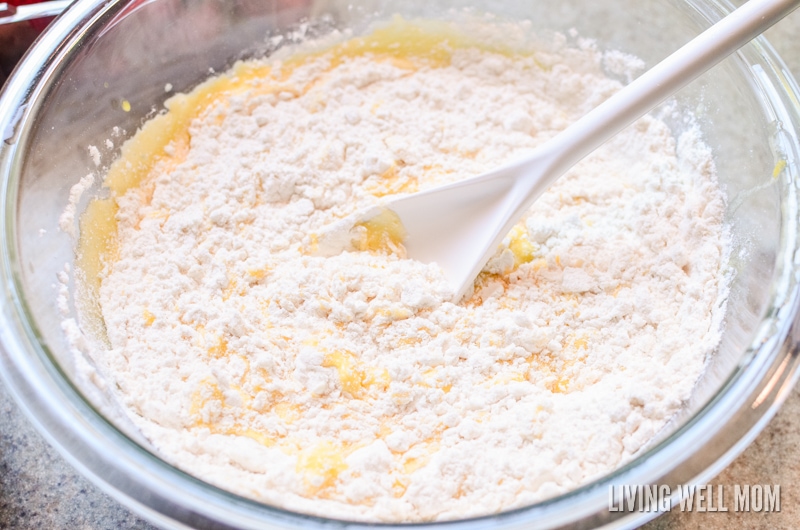flour and salt being added to yolk mixture
