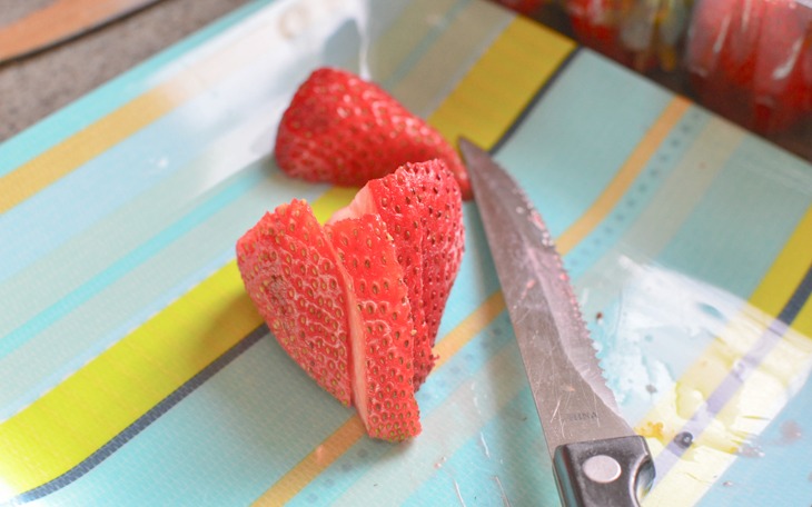 a strawberry sliced up 