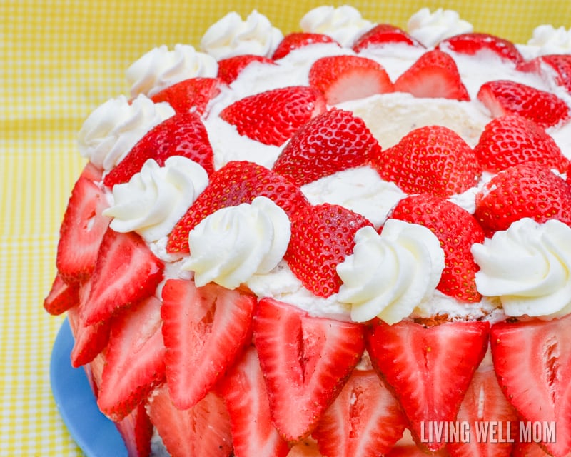 homemade strawberry cream cake decorated with fresh berries