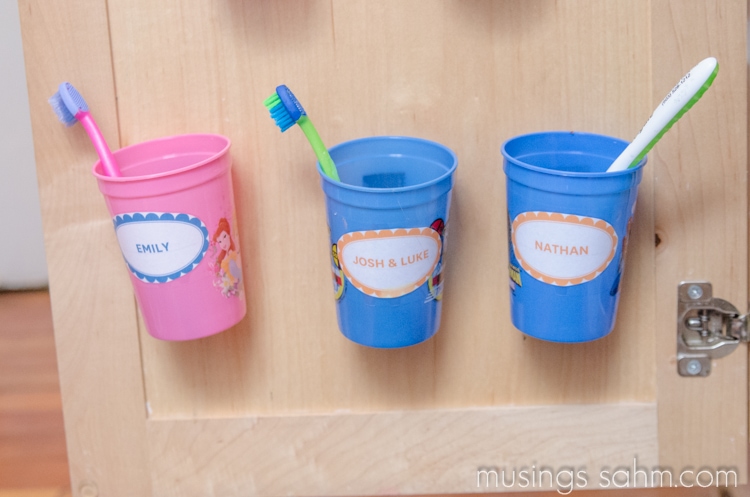 three storage cups for toothbrush organizer ideas