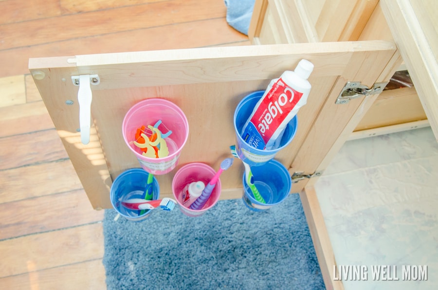 Keep kids’ toothbrushes off the counter and hidden with this handy organizing idea!