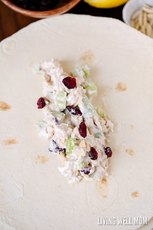 Cranberry chicken salad in the middle of a tortilla.
