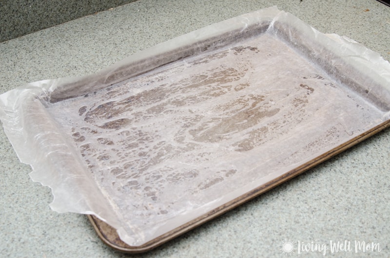 baking sheet with parchment paper on it