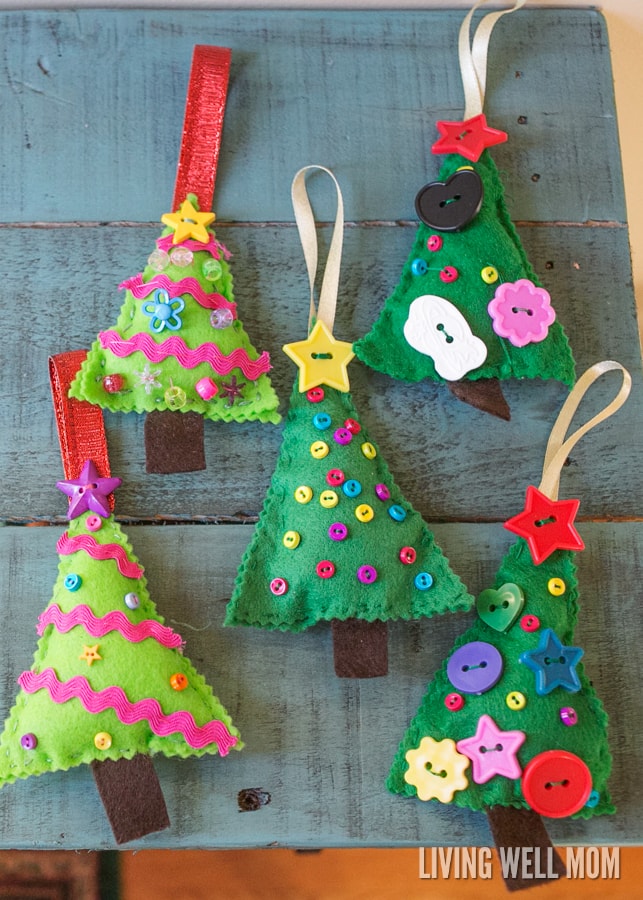 Felt Christmas Tree Ornaments are a perfect first sewing project for kids as young as 4 years. Easy to make, this craft can be customized and enjoyed all the way up to adults!
