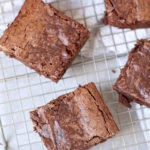 Super-Moist Avocado Brownies are mouthwateringly delicious! Kids love this egg-free brownie recipe too and with just 10 minutes prep time and 30 minutes to bake, you can enjoy this healthier chocolate dessert in no time!