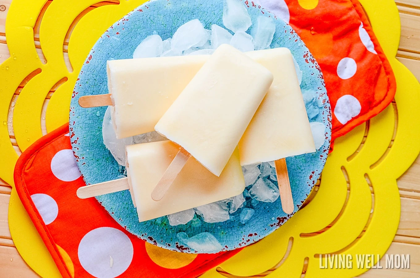 These Orange Yogurt Popsicles are unbelievably easy to make and a satisfying nutritious snack kids of all ages will love. And you’ll love how this simple recipe will fill them up, thanks to the added protein from the yogurt!