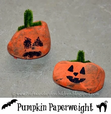 pumpkin paperweight craft made out of rocks