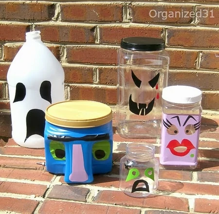 jars turned into halloween faces