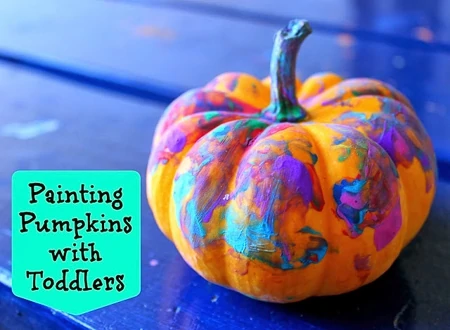 toddler painted pumpkin as a halloween arts and crafts project 