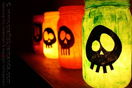 diy skull lanterns in colorful mason jars