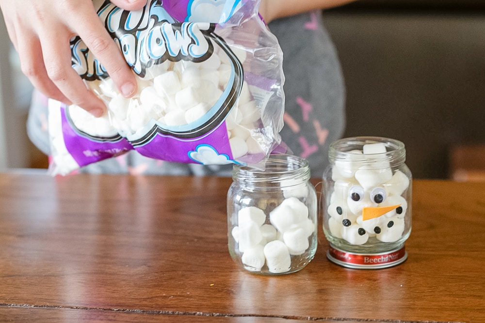 A homemade gift idea that doubles as a fun craft for kids, this DIY Hot Cocoa Snowman is adorable and easy to make too!